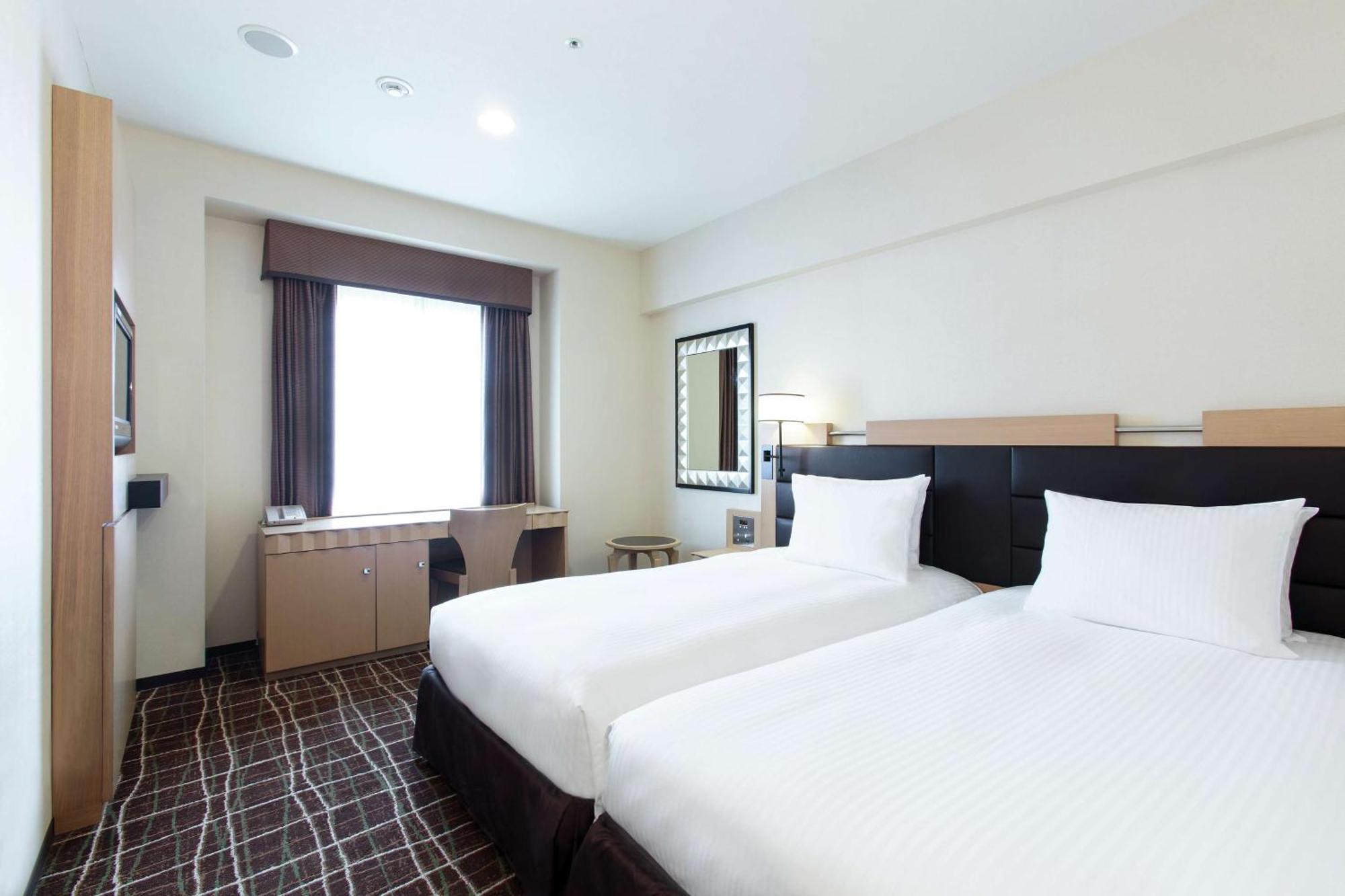 Отель Doubletree By Hilton Наха Экстерьер фото